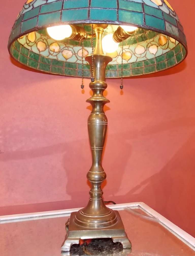 brass lamp with glass shade