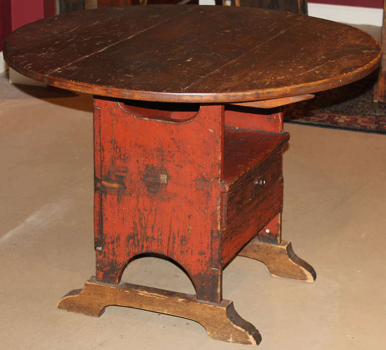 Red painted shoe foot chair table with tilt top is circa 1820 with great surface and patina, some restorations.