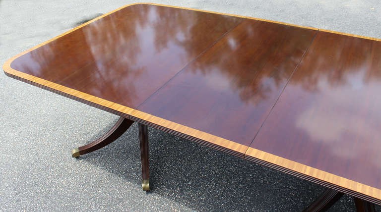 Regency Style Mahogany Banded Triple Pedestal Dining Table