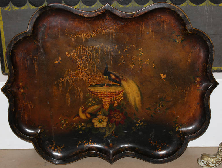 19th Century English tole tray with polychrome painted peacock and Chinoiserie decoration, along with nicely scalloped edges.