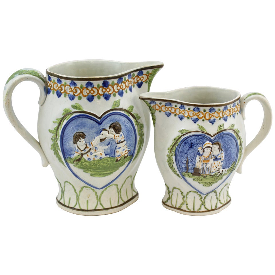 Graduated Pair of English Staffordshire Prattware Jugs