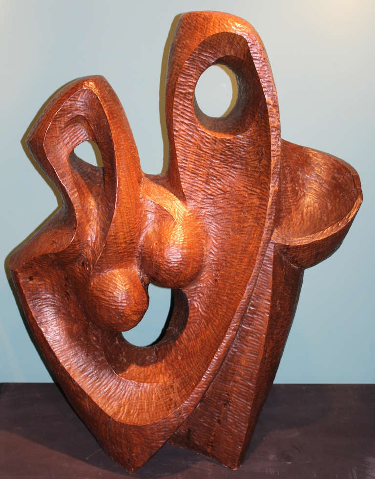 This abstract sculpture was done by New Hampshire artist Robert Hughes (1915-2004). Hughes was born in Providence, Rhode Island and later moved to Berlin, New Hampshire, where he became well known as teacher for 43 years in the Berlin school system,