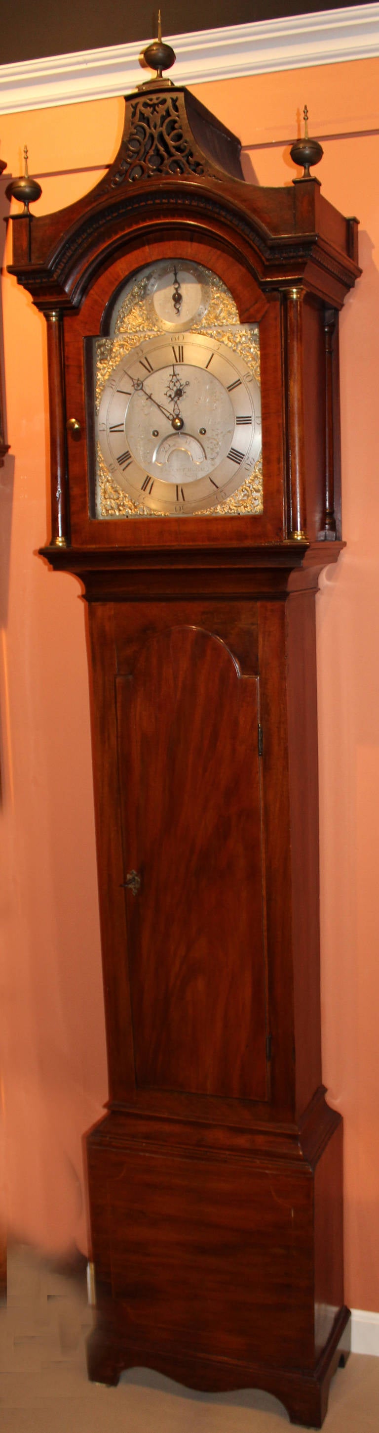 John wood, Grantham, England, late 18th century mahogany tall or long case presentation clock, with a brass eight-day weight-powered movement, with strike and silent indicator, seconds hand, and calendar aperture, applied spandrels and chapter