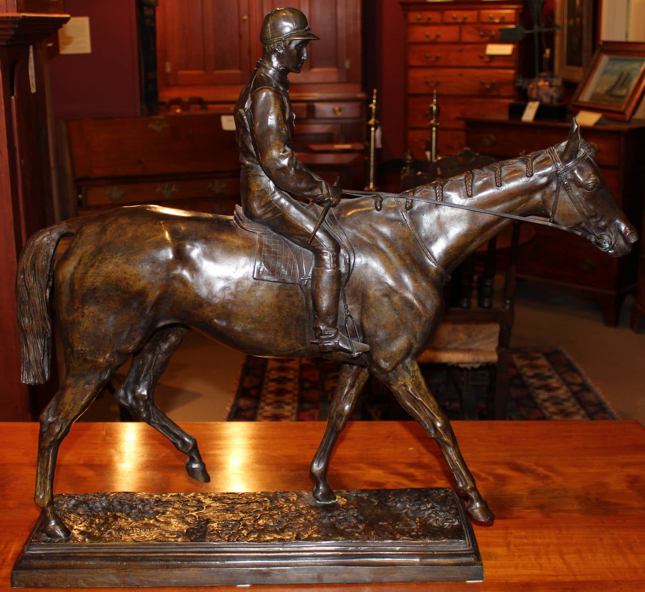 This patinated equestrian bronze casting titled Derby Winner or Jockey Sur Sa Monture was originally done by French artist Isidore Jules Bonheur (1827-1901). Bonheur was born in Bordeaux, France, the younger brother of Rosa Bonheur and he became