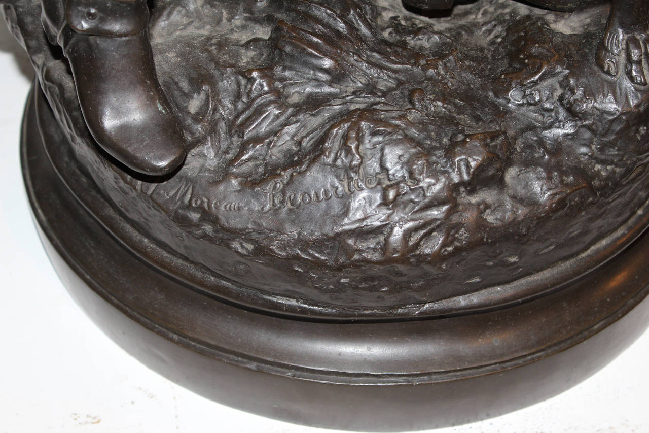 D'après H.F. Moreau & P. Lecourtier:: bronze figuratif d'un chasseur et de chiens de chasse 1