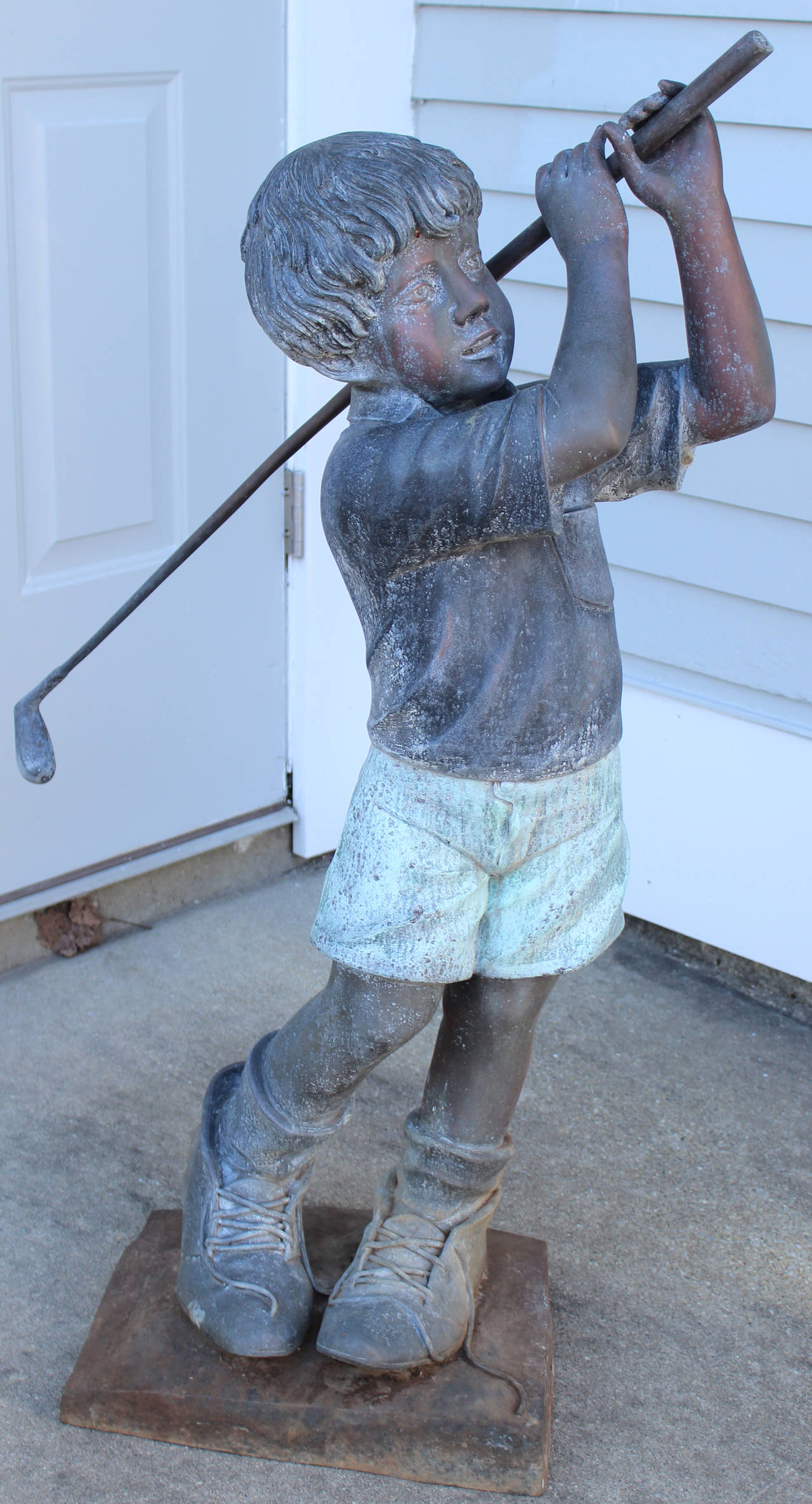 Patinated Bronze Garden Ornament of a Young Golfer