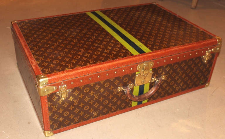 This nice Louis Vuitton hardside suitcase with interior tray
has the Louis Vuitton Paris label inside. Provenance: M. Exnicios, Watch Hill, Rhode Island.