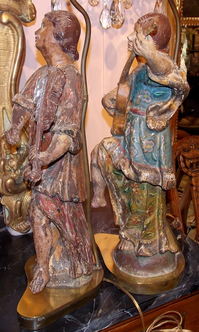 Carved 18th Century Pair of Santos Lamps