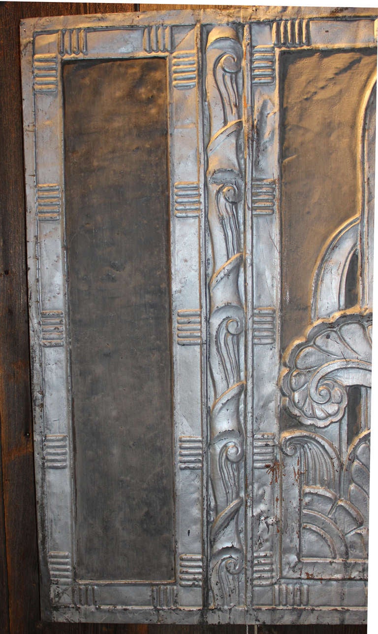 This nice silvered copper Art Deco panel of the period is probably an architectural element from a stage or hotel, mounted to a wooden frame, with wonderful geometric designs, typical of the period.