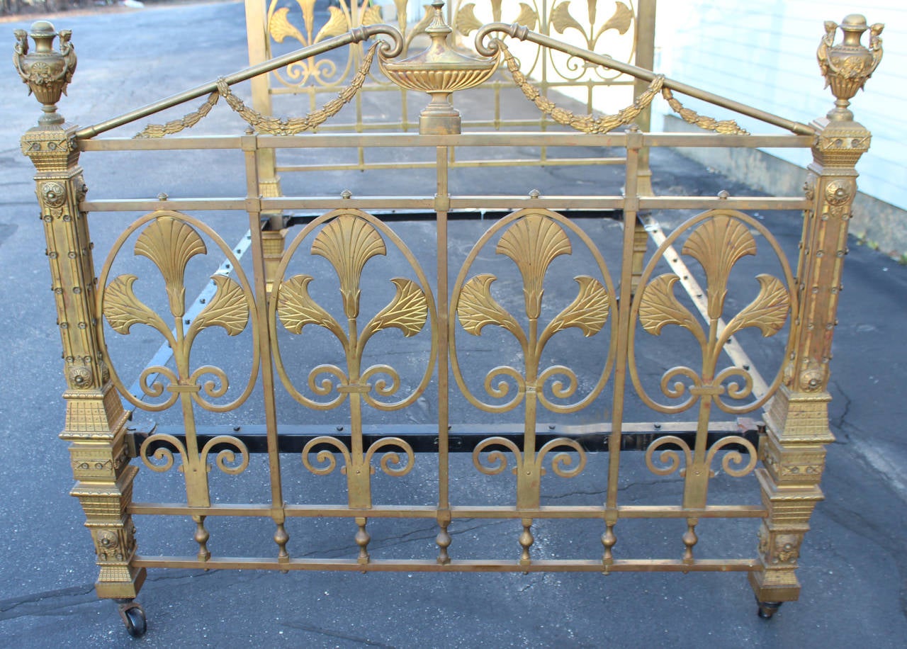 The spectacular bed is constructed of highly ornate cast brass in a French style. The maker is the Albert Phillips Excelsior Works of Eyre St. Birmingham, England. The maker’s identity is given on a plate attached to a cross rail.Phillips Excelsior