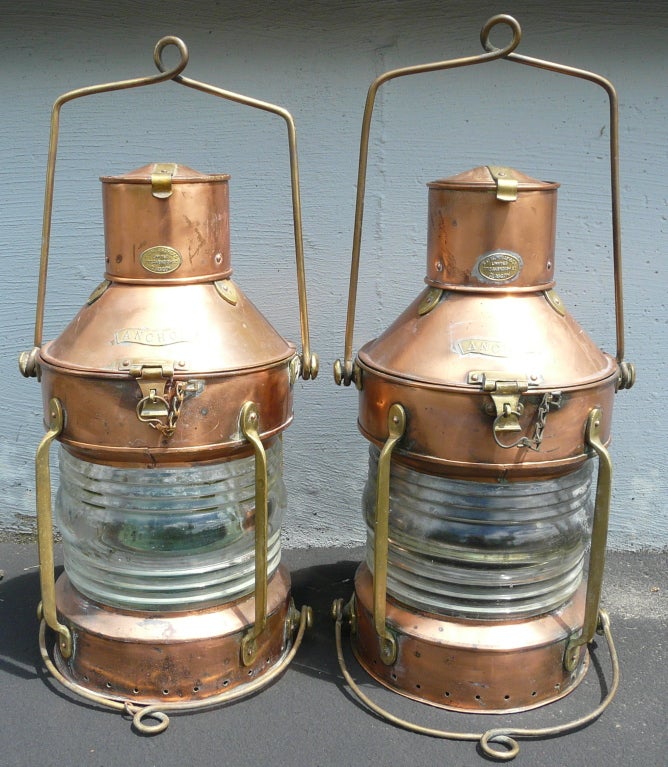 Excellent and all original, pair of copper and brass ship's anchor lights made by R.C. Murray, Glasgow, Scotland circa 1920.  These lanterns were hoisted onto the mast when anchored to mark location.  Lenses are clear to signify at anchor.  Original