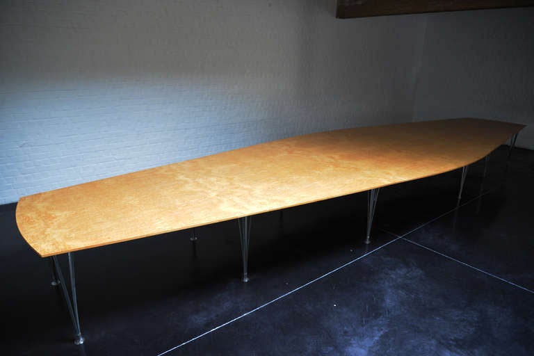 This is one very unique Bruno Mathsson and Piet Hein very large and long dining table. Made of 5 top and 13 foot. It can be arranged in three different tables, 280, 520 or 742 CM. 200 CM at the center.