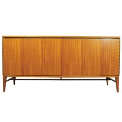 The Calvin Group Stretcher Base Credenza Cabinet by Paul McCobb
