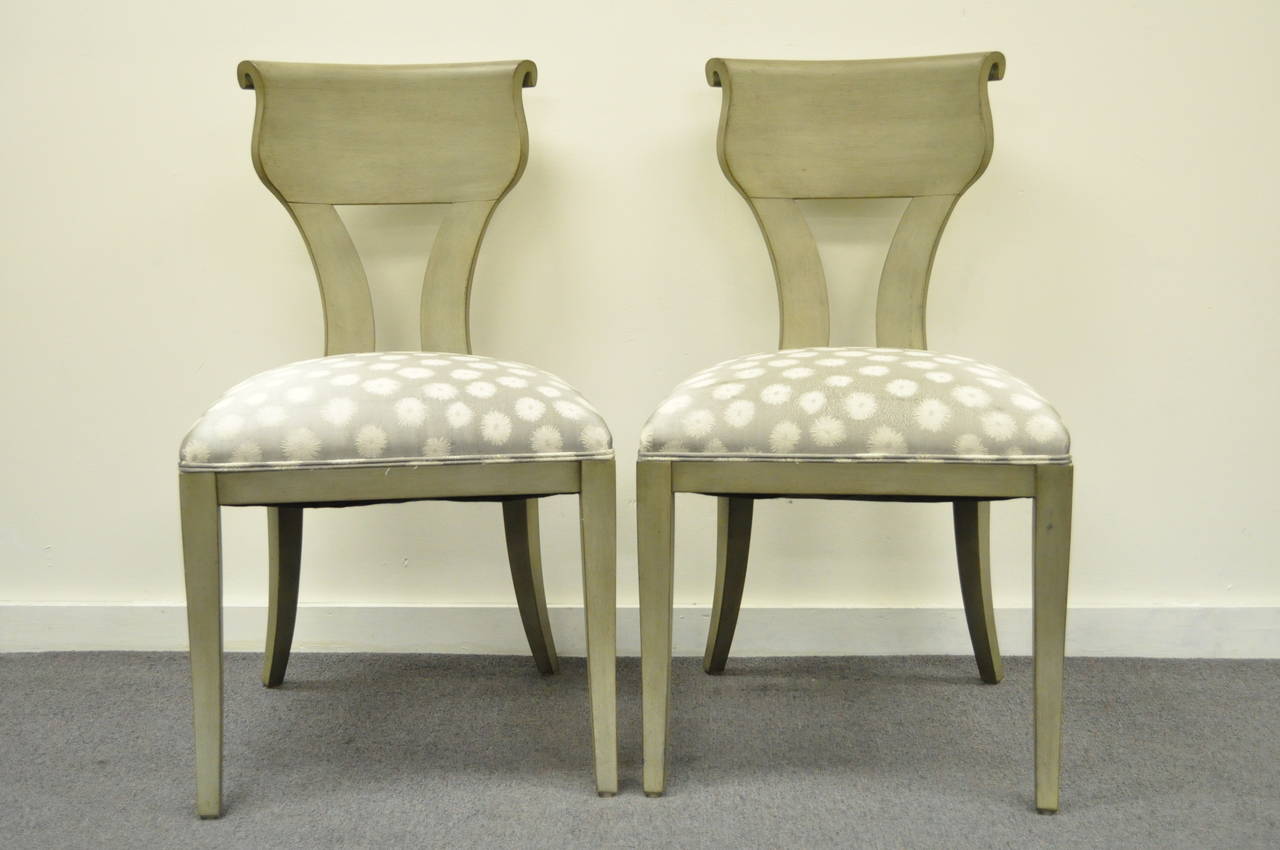 Very nice pair of  Vintage Neoclassical / Hollywood Regency Style Klismos Side Chairs with a Greenish Gray Wash Painted Finish. The set features scrolled shapely backs and remarkable clean lines to the frames.