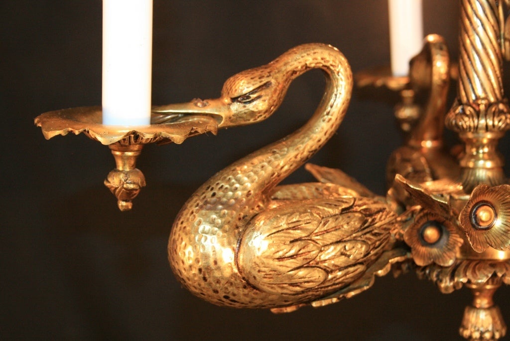 Vintage French Empire Style Heavy Solid Brass Chandelier having 3 Full Figured Swans. This wonderful petite chandelier has 3 lights and fabulous form. The brass engravings are very fine and detailed within this fixture. Item measures 15.5