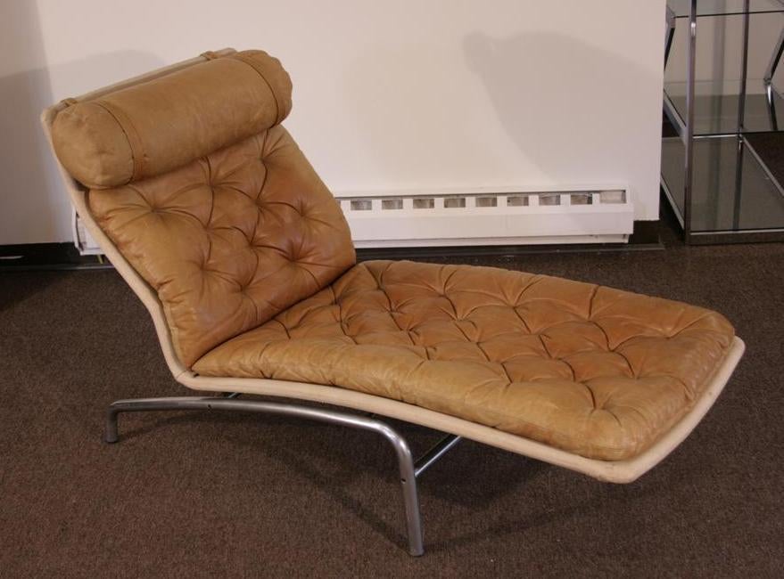 Vintage Mid Century Danish Modern Tufted Leather Chaise Longue on Aluminum Floating Frame attributed to Arne Vodder for Erik Jorgensen Mobelfabrik. Item features beautifully aged original tan leather, leather tufts, aluminum base, and a sculpted