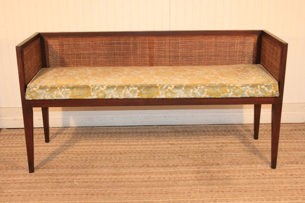 Solid Mahogany Mid Century Modern Long Cube Window Bench/Settee with caned back and sides. There are no remaining labels but this piece could possibly be by Edward Wormley for Dunbar. The frame is constructed of very heavy solid mahogany and the