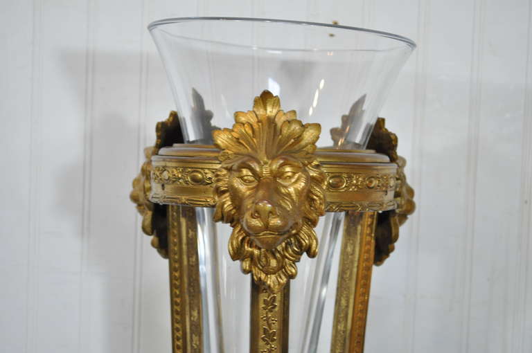 Remarkable 19th Century French Gilt Bronze Plant Stand / Pedestal with Glass Vase Insert. This stunning piece features a highly decorated bronze frame with figured lion accents, paw feet, acanthus drapes and engravings throughout, and heavily