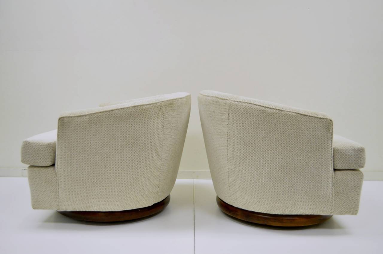 Mid-Century Modern Pair of Walnut Base Swivel Barrel Back Club or Lounge Chairs after Milo Baughman