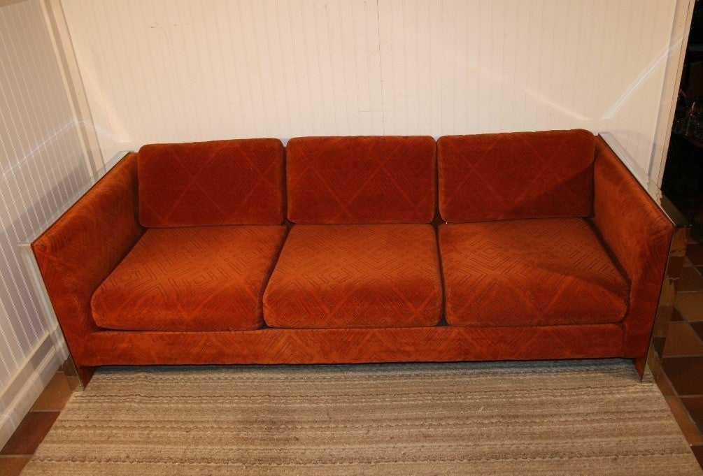 Sleek Vintage Mid Century Modern Milo Baughman Style sofa by Selig Monroe. This beautiful piece features the best modernist lines and beautiful original orange patterned fabric which is free of rips or stains and in overall very good original
