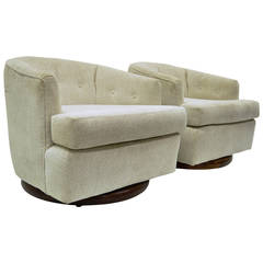 Pair of Walnut Base Swivel Barrel Back Club or Lounge Chairs after Milo Baughman