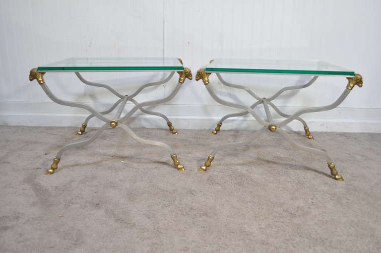 Remarkable High Quality Pair of Italian Rams Head & Hoof Foot Brushed Steel and Brass Neoclassical Style Square End Tables with Thick Glass Tops. The pair features classic X-form stretcher bases with cast solid brass rams head and hairy hoof foot