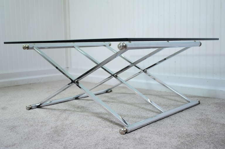 Unique Vintage Triple X Stretcher Base Chrome Coffee Table with Square Glass Top in the Milo Baughman / Maison Jansen Style. 