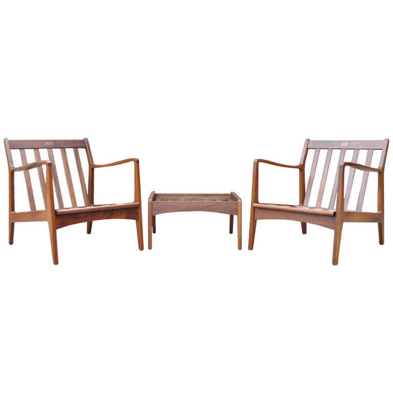 Pair Royal Danish Collection Sculpted Lounge Chairs 
Ottoman after Poul Jensen