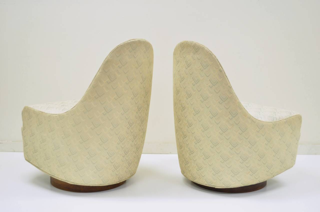 Mid-20th Century Pair of Petite Swivel Slipper Walnut Lounge Chairs by Milo Baughman