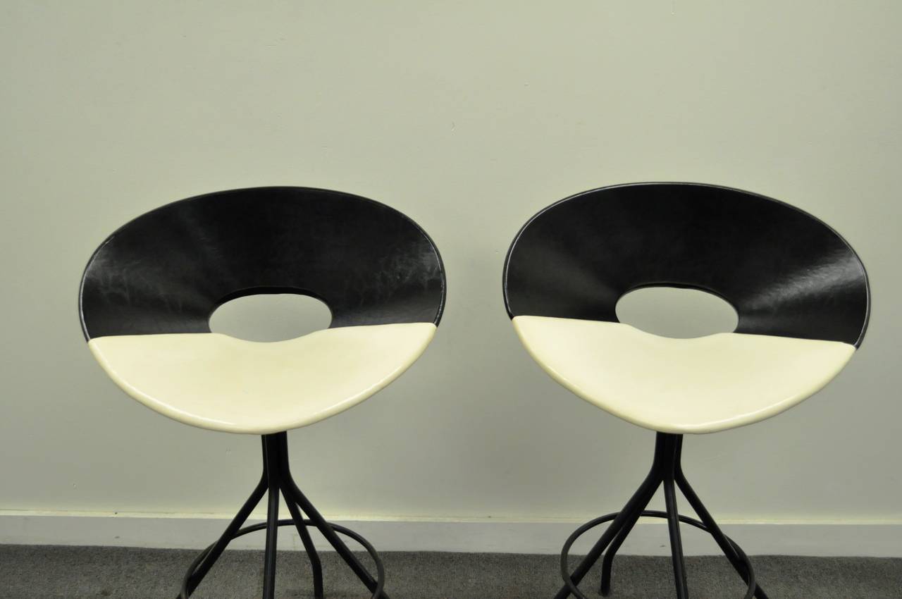 Mid-Century Modern Circa 1950s Pair of Mid-Century Italian Style Modern Swivel Vinyl Bar Stools