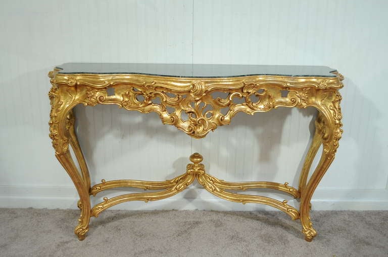 Stunning Vintage Italian Carved Wood Gold Gilt Console Table with Green Marble Top and Matching Ornately Carved Wall Mirror by Labarge in the French Rococo Taste. Made in Italy. 

Console table measures 35