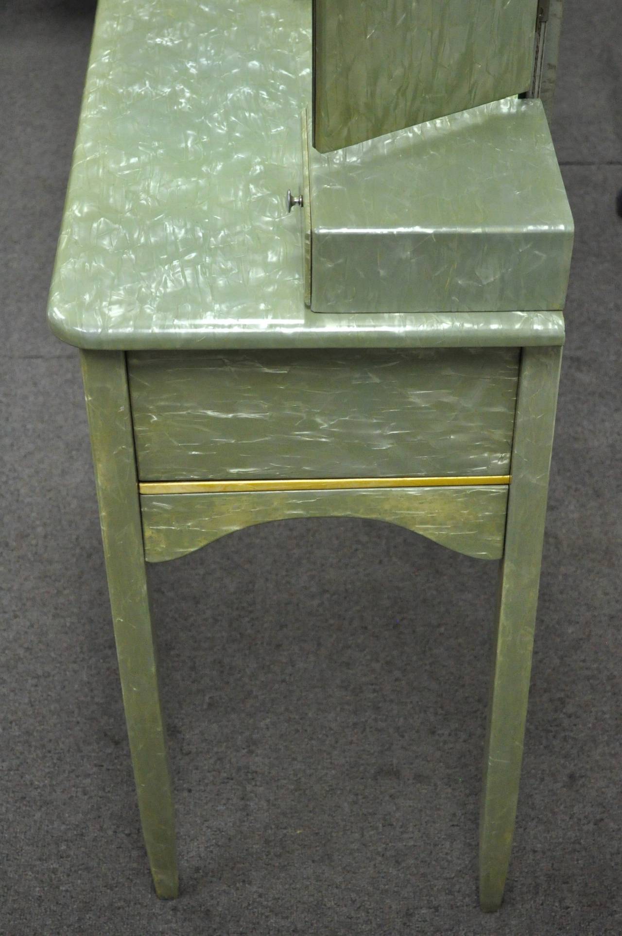 Rare Art Deco Green Celluloid Covered Vanity with Tri Fold Mirror and Bench In Good Condition In Philadelphia, PA