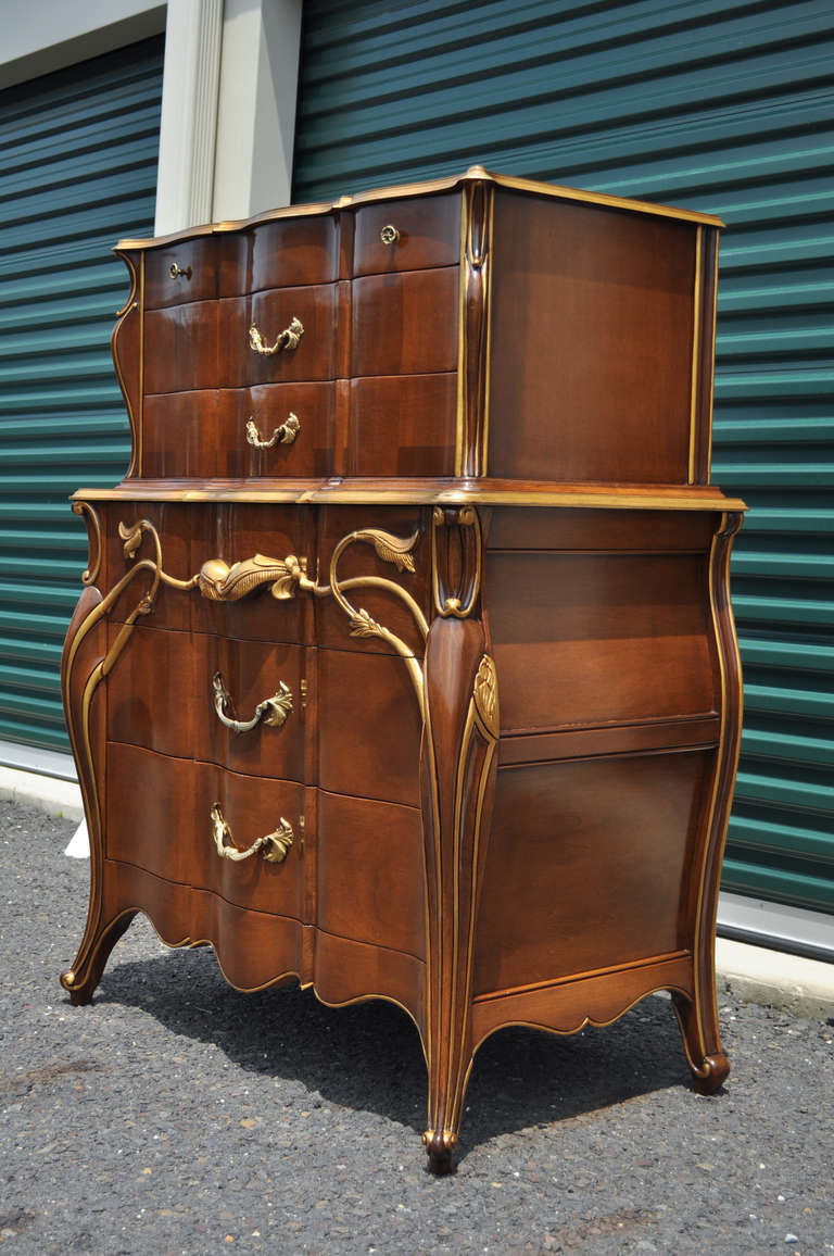 Shapely Vintage Solid Cherry Art Nouveau Style Hollywood Regency Tall Chest by Bethlehem Furniture Mfg. of Red Lion, PA. This chest features 6 dovetailed drawers, gold gilt accents, and great floral designed frame. Very stately piece