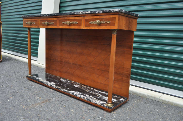 Beautiful Neoclassic / French Empire Style Vintage Rosewood and Cherry Console Server by Bethlehem Furniture Mfg. of Red Lion, PA with 2 tiers of stunning marble, brass mounted ormolu columns, ornately decorated handles, and stately form.
