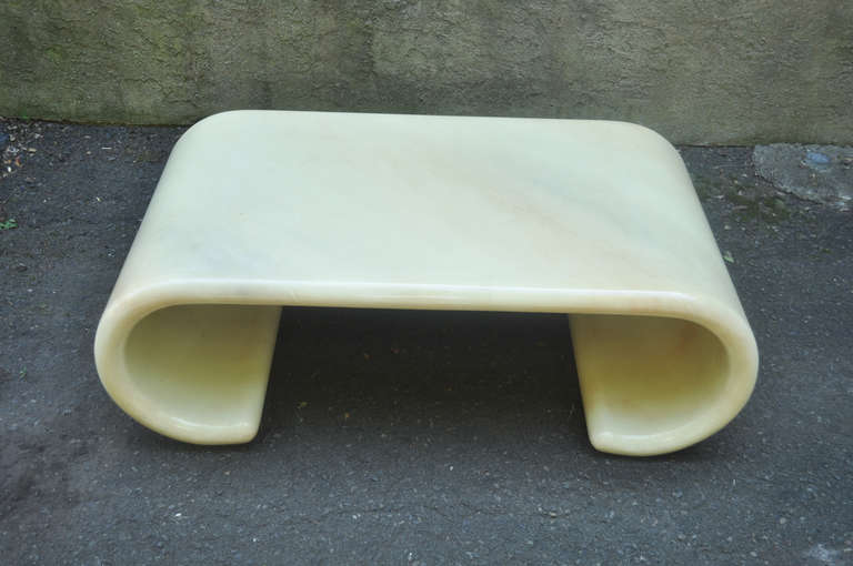 Impressive Vintage Mid Century Modern Lacquered Goatskin Scroll Form Coffee Table attributed to Karl Springer. The piece features a wonderful rippled color, and striking modernist form. Item is constructed of heavy solid wood with the original