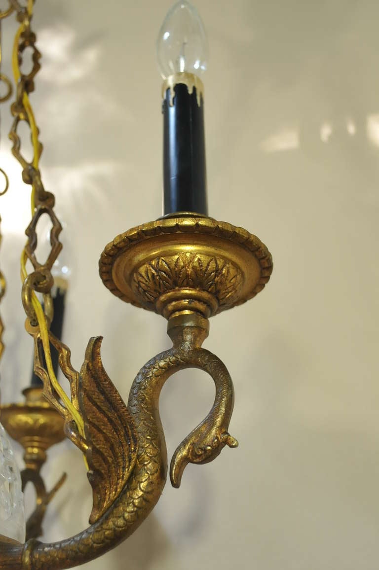 Fabulous Antique 6 Light (4 on the arms and 2 on the inside of the crystal ball) Figural Engraved Brass & Etched Glass Mid-Sized Chandelier in the French Empire/Regency Taste with Remarkable Swan Detailing.