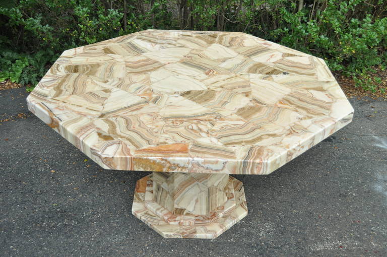 Stunning Vintage Agate and Resin Pedestal Base Dining or Center Table attributed to Guy Muller. This breathtaking piece of art features a mosaic octagonal top (believed to be agate stone veneer encased in resin) with matching pedestal base, and