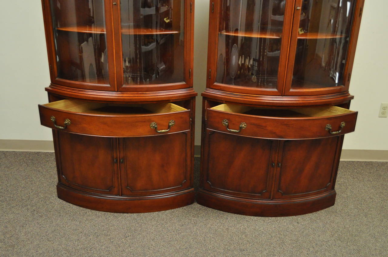 American Classical Pair of 1940s Curved Glass Demilune Form Mahogany Corner China Cabinets