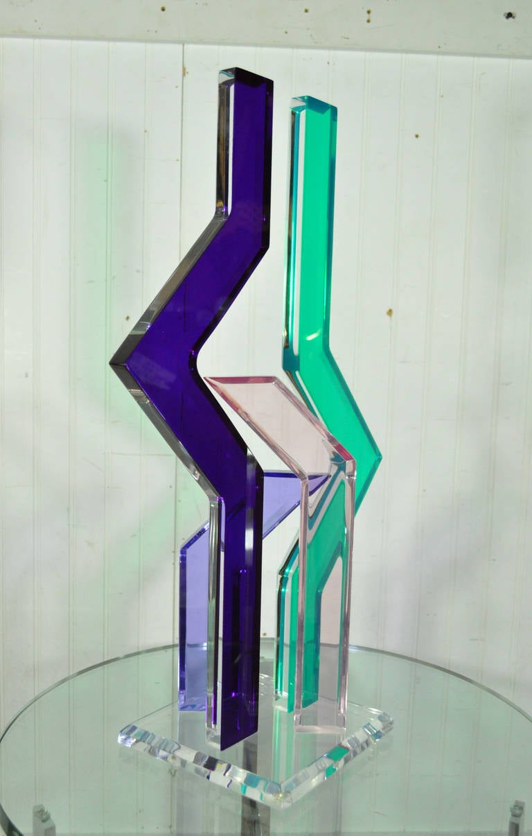 Unique multicolored, contemporary modern, tabletop Sculpture by Shlomi Haziza, circa 1990s. Item features a solid acrylic zig-zag four color form.