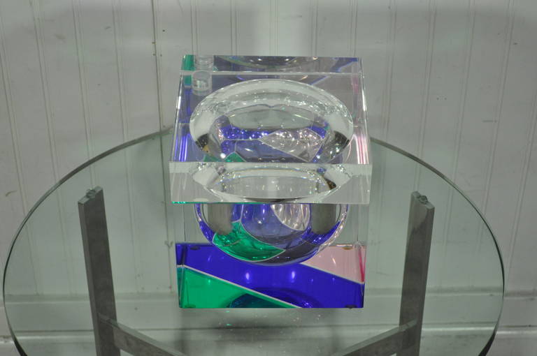 Unique contemporary modern multicolored acrylic hinged tabletop box by Haziza. Item features a unique geometric designed interior with a swiveling hinged top and heavy solid acrylic construction.