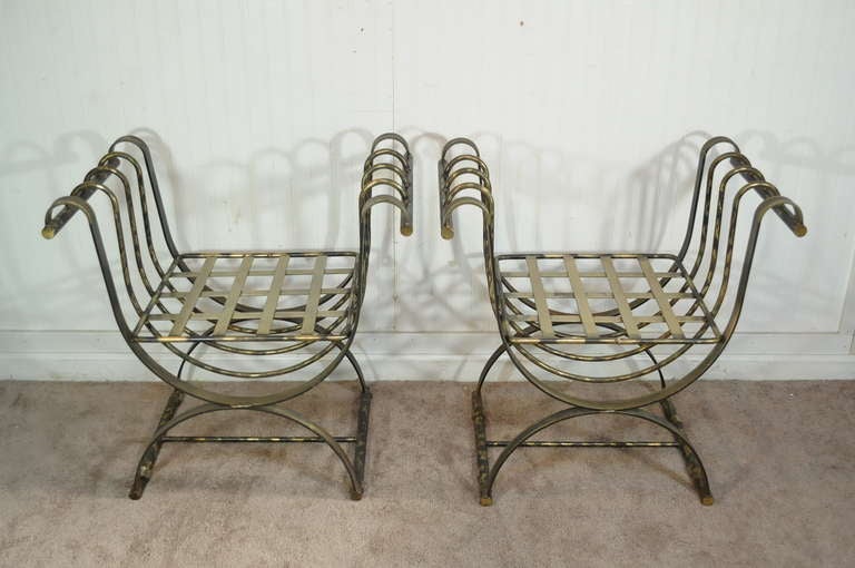 Remarkable pair of mid-late 20th century heavy iron X-form Curule throne benches in a burnished brass / bronze finish. Each bench weighs approximately 50 pounds and the form is absolutely stunning. Unmarked but more than likely of Italian origin.