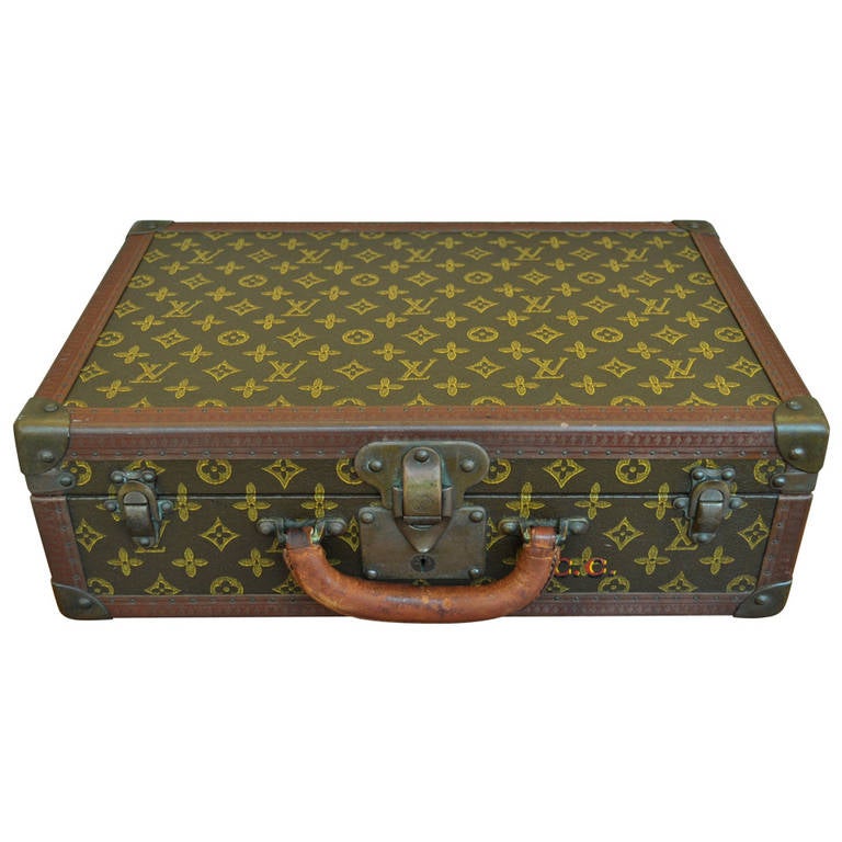 Vintage Louis Vuitton hard-sided suitcase