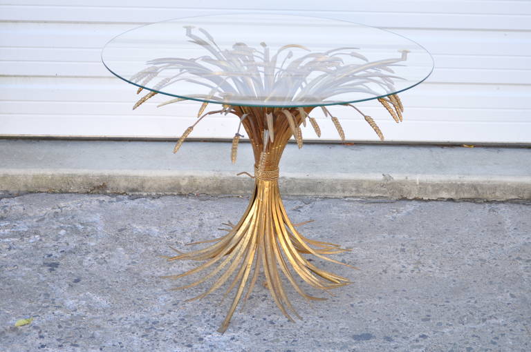 Rare Italian Hollywood Regency Gold Gilt Metal Sheaf of Wheat form Center Table. This stunning vintage, Hollywood Regency, table features a round .25