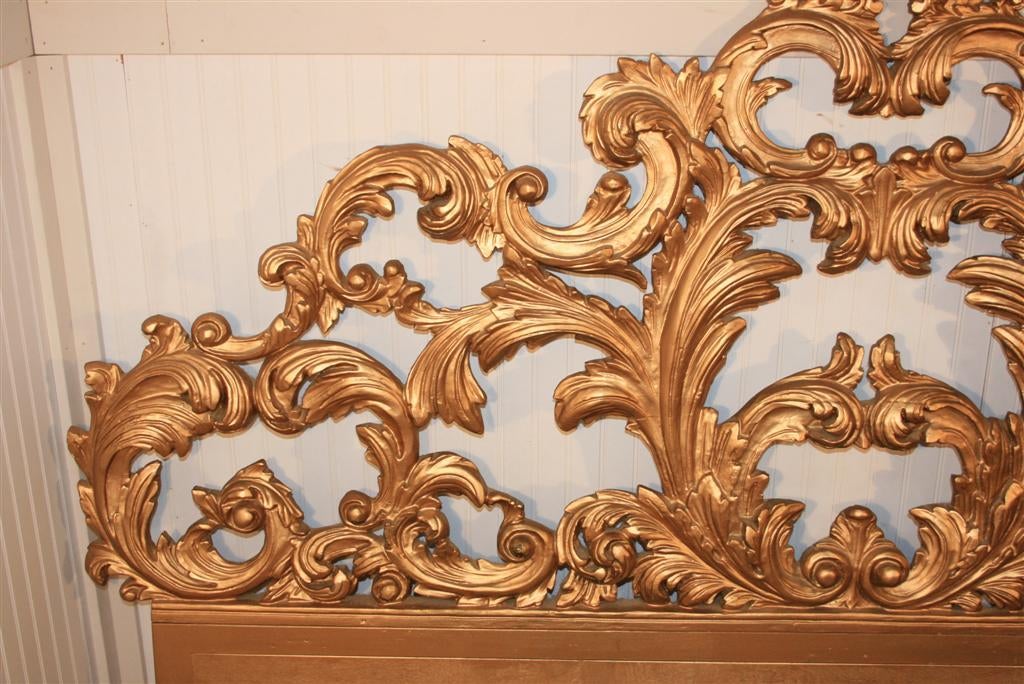 Vintage Carved Wood and Gesso Rococo Style Gold King Size Headboard in gold with extremely ornate feathered carvings.