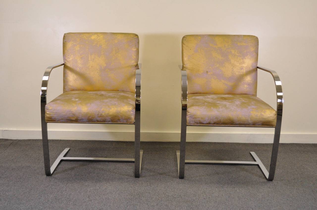 Quality Pair of Vintage Flatbar Chrome Plated Steel Cantilever Armchairs by Cy Mann of NYC in the Knoll Mies Van Der Rohe - Brno Style.This vintage pair of chairs features heavy seamless construction and classic modernist form. Original fabric is