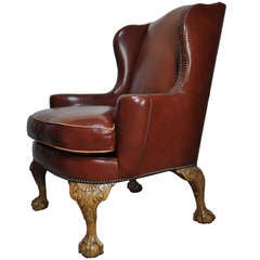 Superior 20th C. Brown Leather Ball and Claw Foot Wing Back Library Armchair with Nailhead Trim