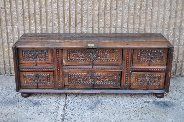 Remarkable Antique Spanish Revival Heavily Distressed 6 Drawer Console believed to date back to the Early 19th Century but possibly earlier. This remarkable work of art features dovetailed construction throughout including the drawers, top, sides,