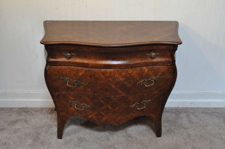 Beautiful Italian 3 drawer Bombe commode with fine antiqued parquetry detailed finish and classic French Louis XV Form.