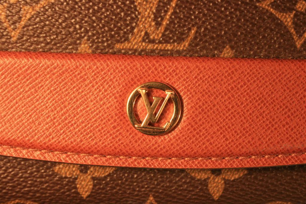 Louis Vuitton Monogram Perforated Samur Clutch – Jadore Couture