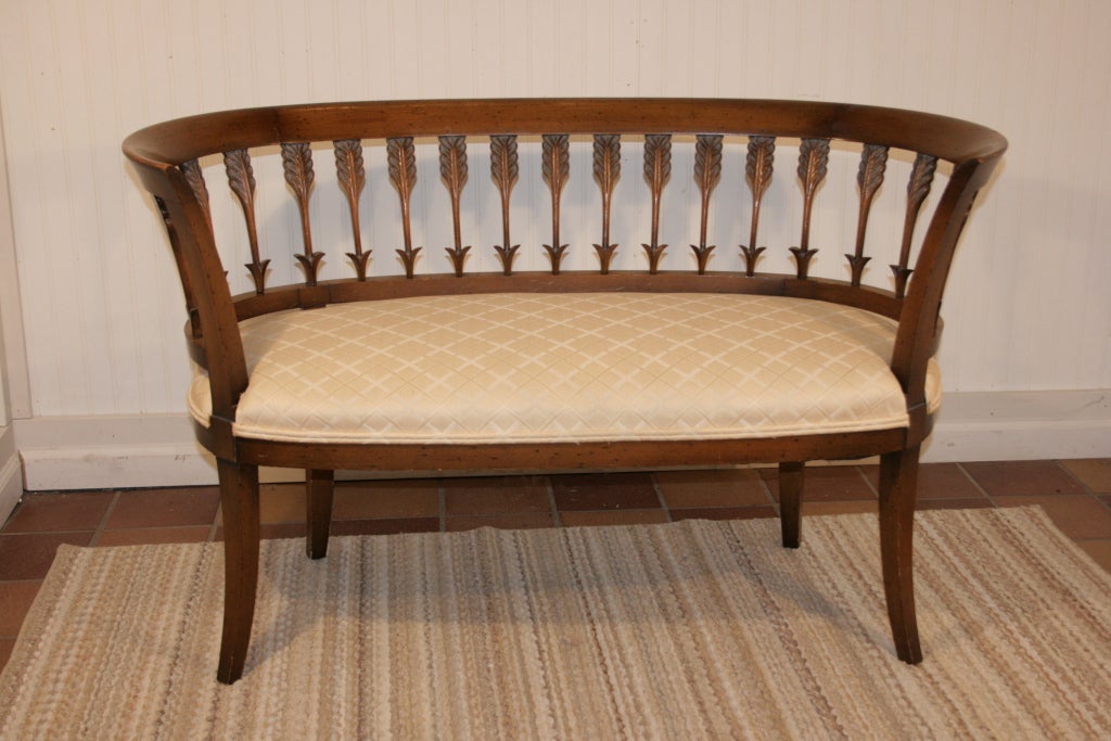 Fine Carved Wood Arrow Back Half Round Bench. Item features very detailed carved arrown on the back with unique form and shape to the frame.